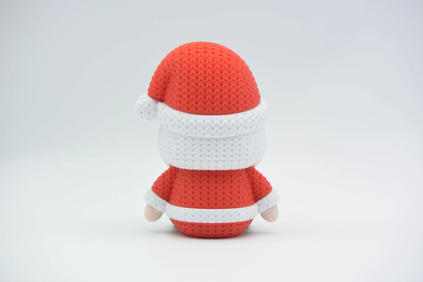 Pletený sediaci Santa Claus